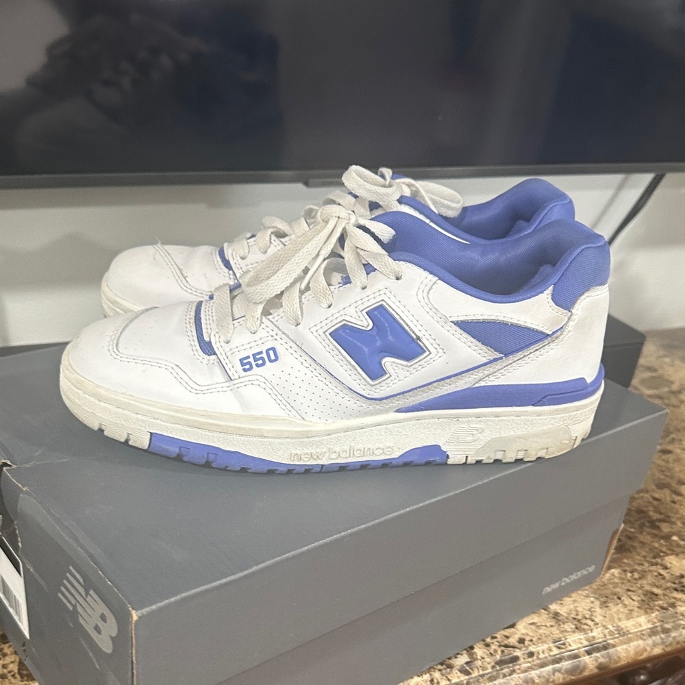 New Balance women’s White and Purple Sneakers